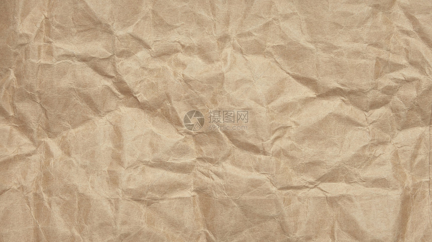 粗糙的工艺棕褐色纸有纹质的朗姆花Brownpaperrumpleandtextured起皱图片