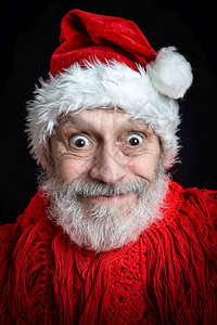 在圣诞节日假扮成圣诞老人的白胡子成年男的肖像人惊喜oopicapi图片