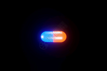 药片头痛麻醉剂蓝色和橙医用胶囊在黑底3D涂层上闪光设计图片