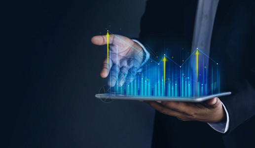 会议技术高利润股票市场商业增长战略规划概念适合现货图案的商人和数字平板电脑图表信息现代的管理设计图片