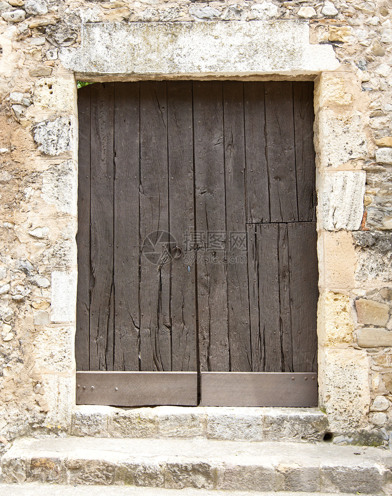 屋木头历史的西班牙古老木制大门图片