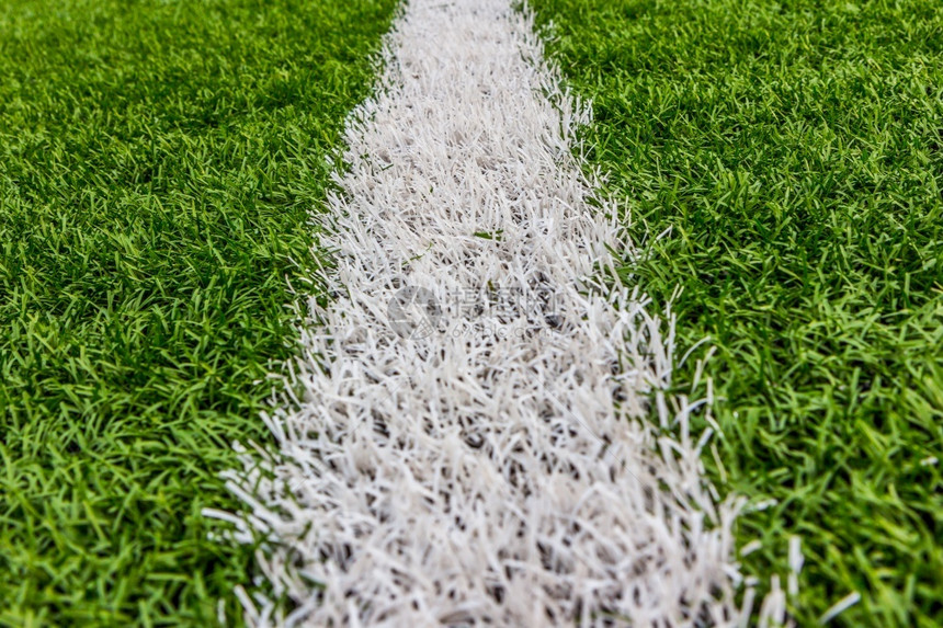 地毯带白条足球体育场的人工草造坪植物图片