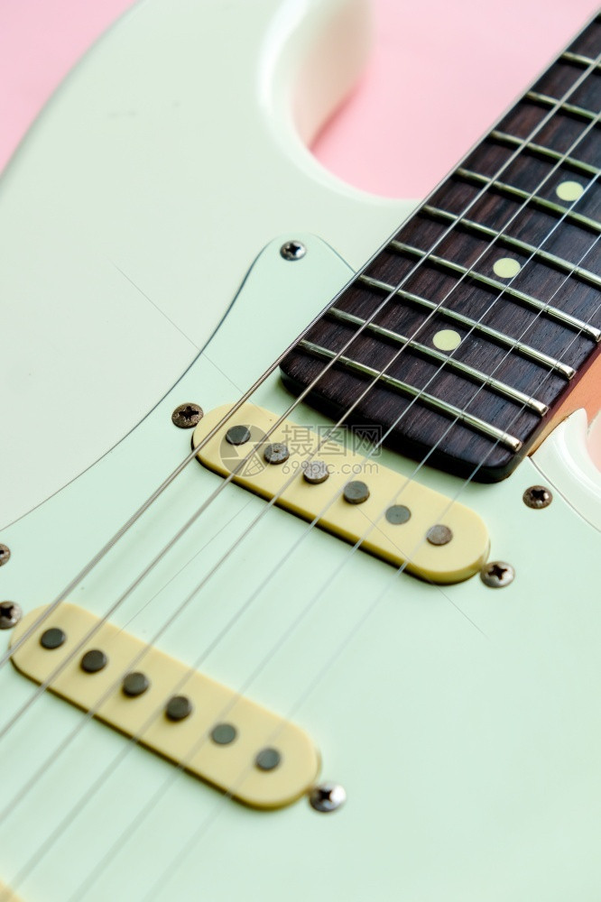 白电吉他粉红色背景的详细信息岩石脖子娱乐图片