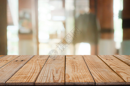餐饮背景模糊的空木制表格的房间酒吧背景图片