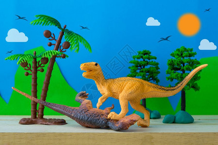 古生物学斗争滔天野生模型背景上的恐龙战斗场景图片