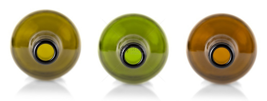 颜色液体干净的白葡萄酒瓶子在色背景下被隔绝图片
