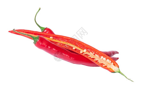 目的种子蔬菜两片半红辣椒和在白背景上被隔离图片