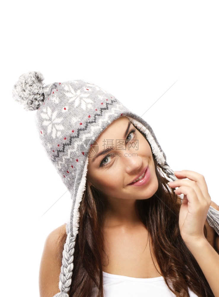 假期十二月身戴冬帽的美丽笑脸妇女身着白色背景的冬季帽子美丽笑脸妇女漂亮的图片