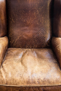 颜色旧皮椅近身棕色纹理变换设计旧皮椅近身棕色纹理原型设计优雅棕色的图片