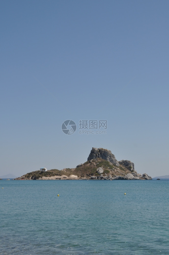多岩石的地中海希腊科斯岛美丽的Kefalos村海图片