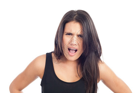 手挫折喊愤怒的年轻黑发女人尖叫的肖像图片
