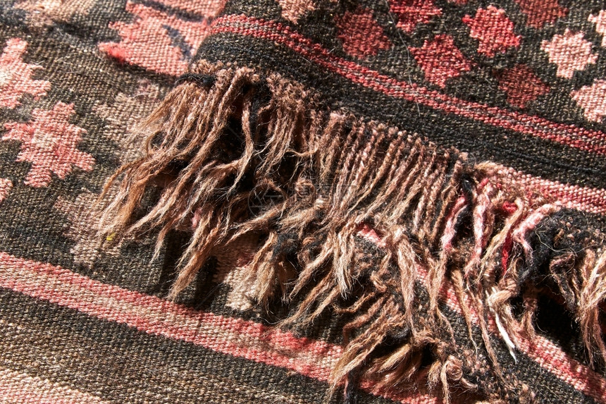 织物粉色的地毯近视编织图片
