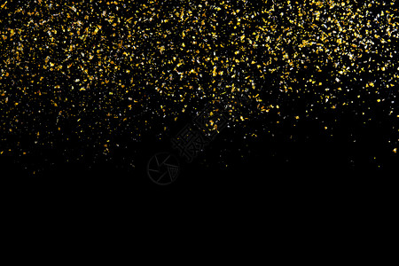 微光黑色抽象背景上的金亮光纹理圣诞节雨图片