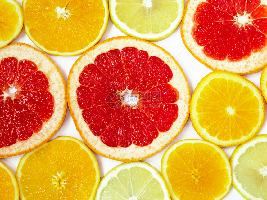 爸柑橘图案的橙子和葡萄柚片柑橘图案的橙子和葡萄柚片彩色柑橘图案脆皮健康图片