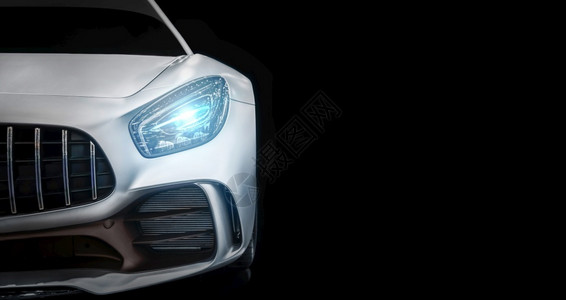 发动机一种现代豪华的新白色运动车用你的空间把灯打开车辆图片