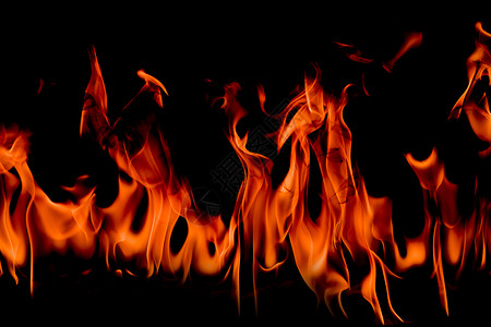 辉光活力抽象艺术背景的火焰燃烧红色热火花上升烈橙光闪耀的飞行粒子危险图片