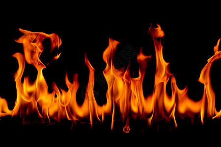易燃火热冒险抽象艺术背景的火焰燃烧红色热火花上升烈橙光闪耀的飞行粒子图片