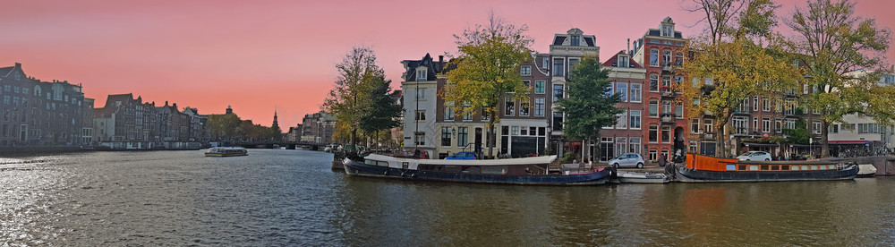 风景优美反射日落时荷兰阿姆斯特丹市风景老的图片
