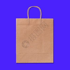 蓝色背景孤立的奢华循环回收纸购物袋Lexury再生纸袋空的商业零售图片