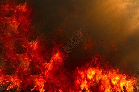 燃烧轮胎红色热火花的抽象营火图片
