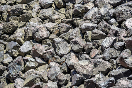 矿物卵石德国港口盆地纹理和背景上的粗砂砾石散积德国灰色的背景图片