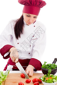 白人背景女餐厅厨师照片Succesfull女厨师切割鞭子围裙图片