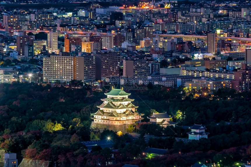亚洲人日落时名古屋城堡和日本市天际线老的文化图片