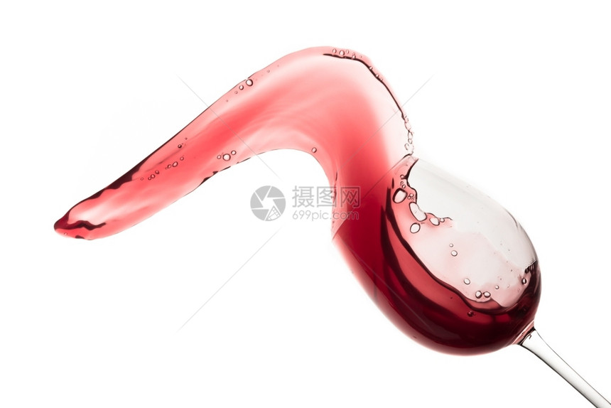 流动溅起餐厅红葡萄酒从玻璃杯中喷出孤立在白色上图片