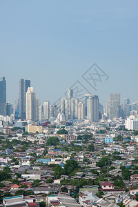 旅行市中心商业拥有高楼和小房子的曼谷市居住密度很大图片