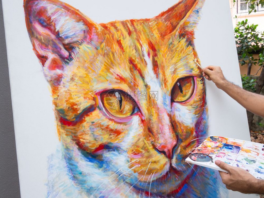 插图丰富多彩的近身艺术家画肖像姜猫白帆布上的丙烯色绘画图片