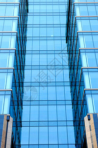 反射近距离拍摄的现代办公大楼外部一张照片银行城市图片