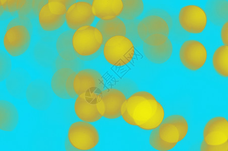 黄色的天空Bokeh抽象光蓝色背景概念爱质地闪亮的墙纸设计图片