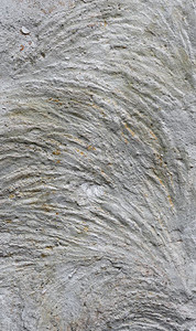 裂缝老的灰色风化石质外部墙壁或生锈建筑楼层的外墙或地表风化石质图片