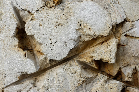 装饰风化石质外部墙壁或生锈建筑楼层的外墙或地表风化石质或者灰图片
