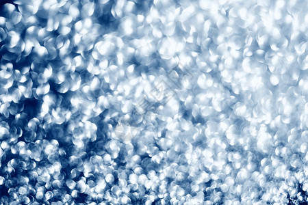 散焦圣诞和新年节日闪光的喜悦式抽象纹理背景有20年经典蓝色条纹眨模糊图片