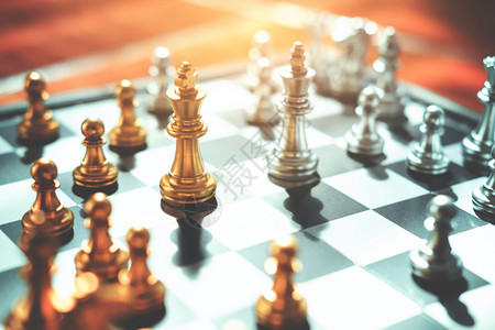 将死成功商业领导者概念的象棋游戏成就播放器图片