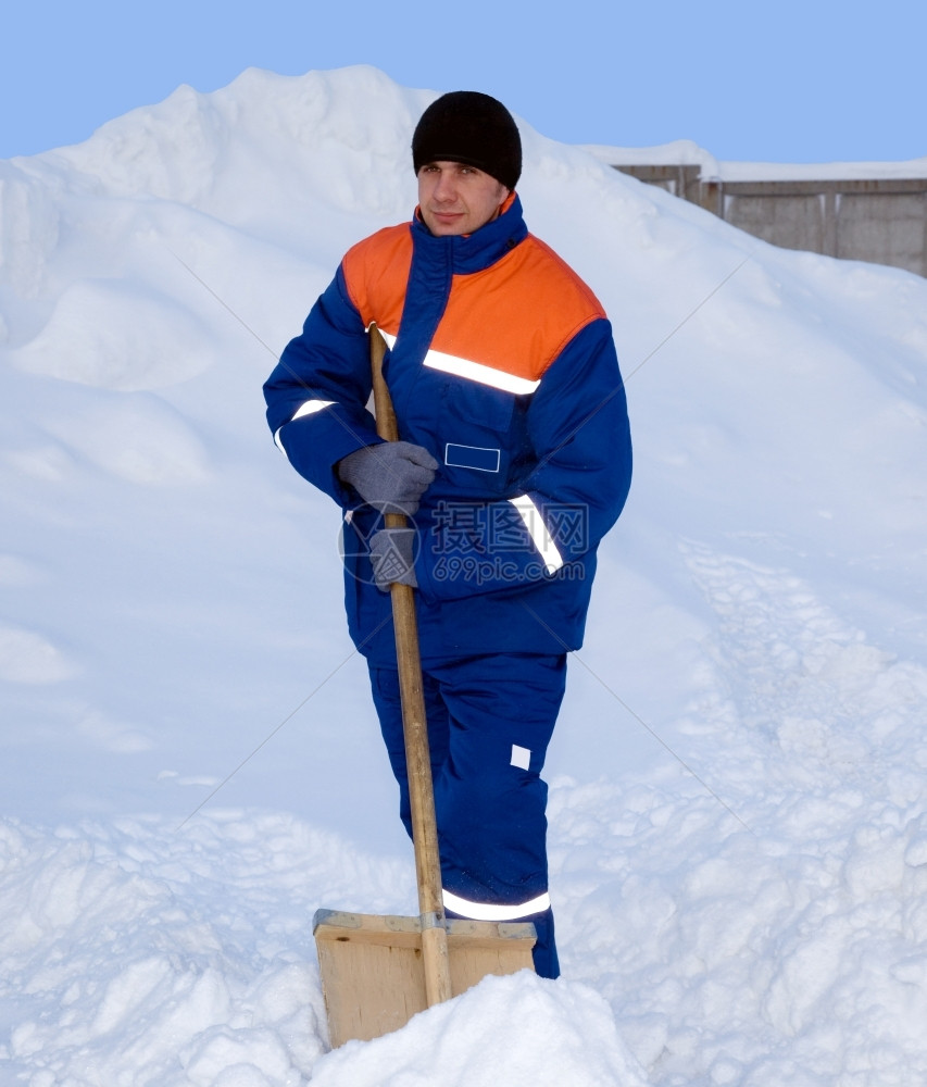 连体工作服活动冬季西装工人包括雪下背景的夹克和长裤子套装图片