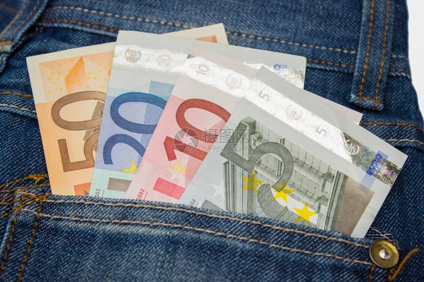 财政硬币速度牛仔裤口的各种欧元钞票图片