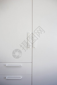 衣柜房间白色壁橱门木特写现代设计背景纹理白色壁橱门木特写现代设计金属背景图片