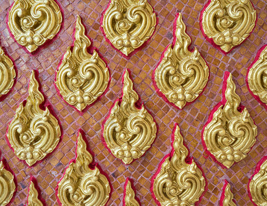 泰国寺庙教堂墙上传统的泰国风格金花纹模式泰神庙古董老的绘画图片