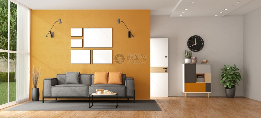 框架居住活的一座现代别墅客厅灰色沙发对着橙墙壁和背景前门3D为一座现代别墅提供客厅图片