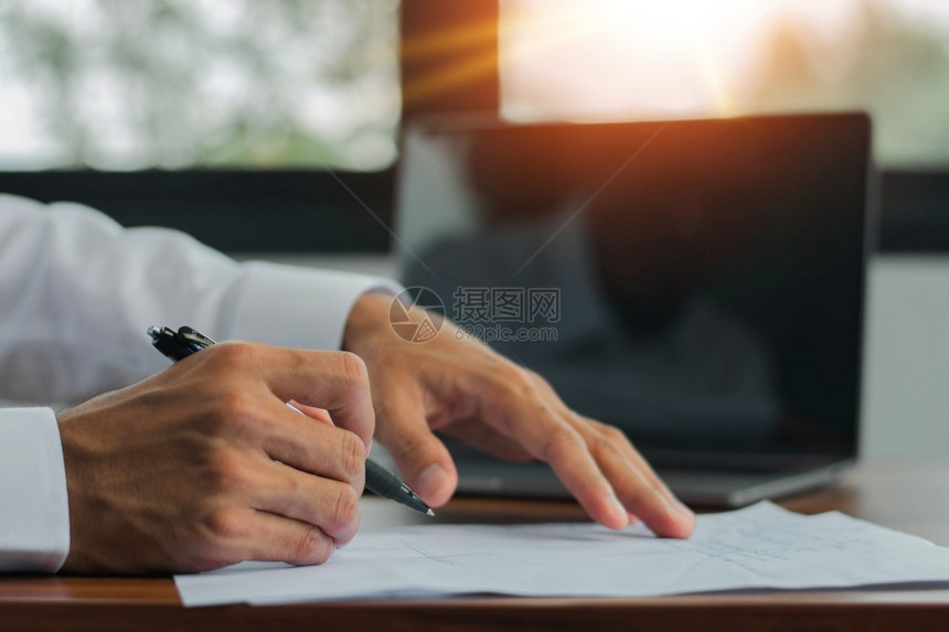 商业文档计算机背景的侧面手写笔文件上的缝合手笔符号infotooltip技术男人图片