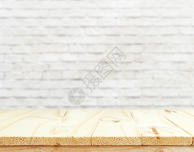 相像的剪辑装饰室内设计室内设计配木制桌板质料准备供您产品使用在模糊的白砖墙壁木制桌面上显示相像装饰内部设计用于广告垃圾摇滚质地设计图片