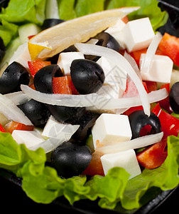 波德希瓦洛夫黑色的生菜叶上greek沙拉宏观拍摄自由度图片