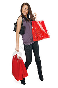 喜悦一个非常快乐的购物女孩拿着袋子充满了欢乐淑女吸引人的图片