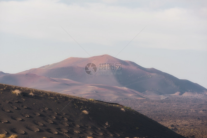 地质学西班牙加那利群岛兰萨罗特蒂曼法亚火山公园假期岩石图片