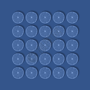 帝王柑圆形的成熟食物新鲜柑橘片的水果图案在深蓝色背景上以隔离平躺顶视图流行艺术设计创意夏季概念一半的橘子柑以最小的风格在深蓝色背景上以设计图片