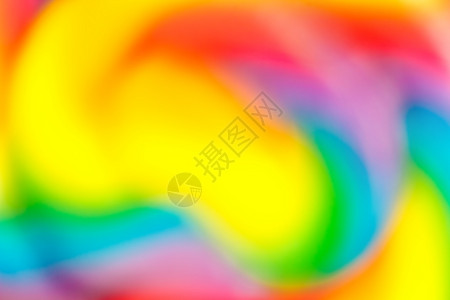 抽象多色背景彩虹螺旋棒糖贴近模糊质地彩色的丰富多图片