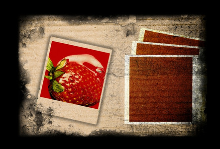 肮脏的艺术Grunge样式背景上带有草莓图像的相机框架转移背景图片
