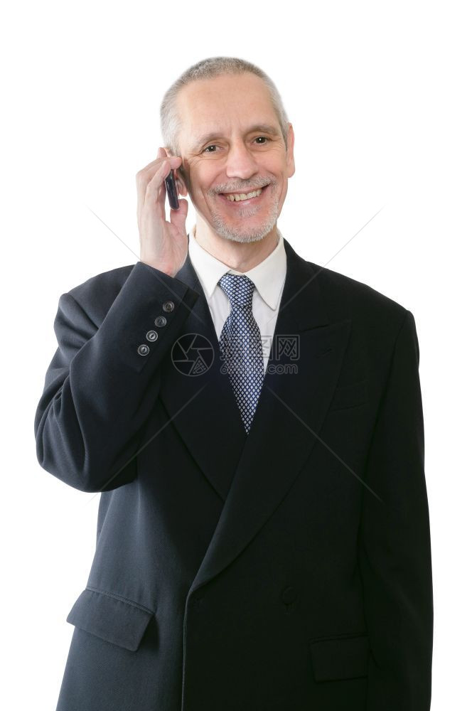 领带一位在手机上微笑的友好商人蜂窝电话图片